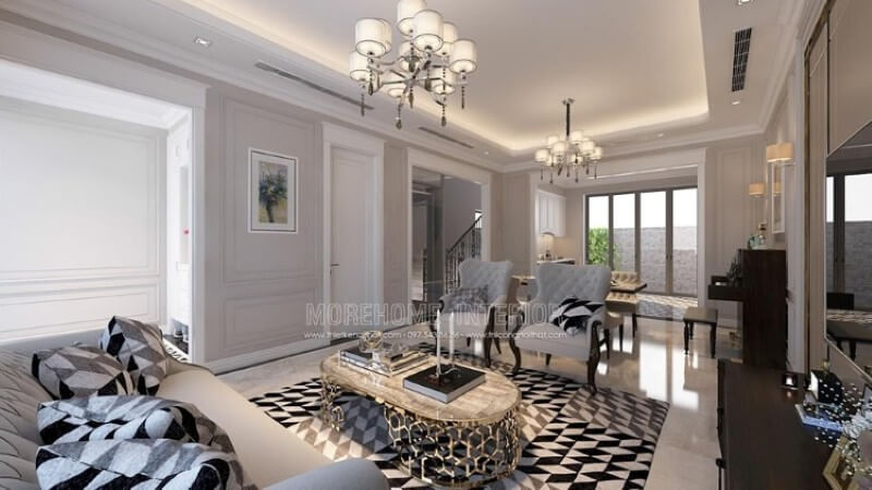 Thiết kế nội thất phòng khách thoáng mát và sang chảnh với mẫu đồ nội thất tự nhiên màu trắng sữa kết hợp chi tiết màu đen lôi cuốn Xem ngay các mẫu thiết kế phòng khách ưa chuộng nhất hiện nay