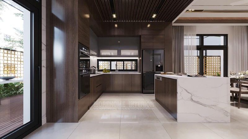 Nội thất phòng bếp được hợp tác giữa gỗ óc chó và đá ốp tự nhiên cao cấp giúp tăng thêm sự quyến rũ.